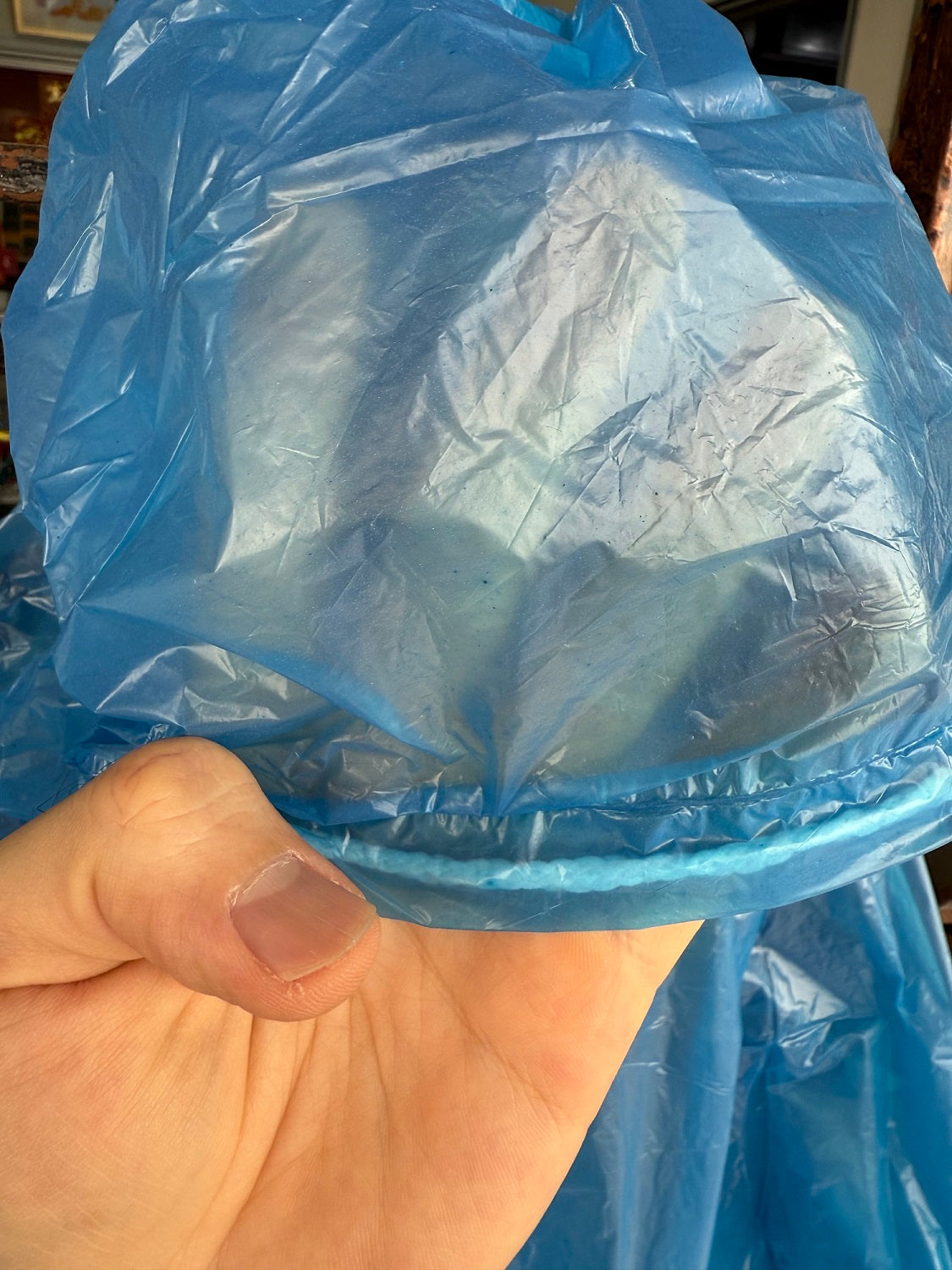 DISPOSABLE PONCHO WITH SLEEVES & DRAWSTRING HOOD